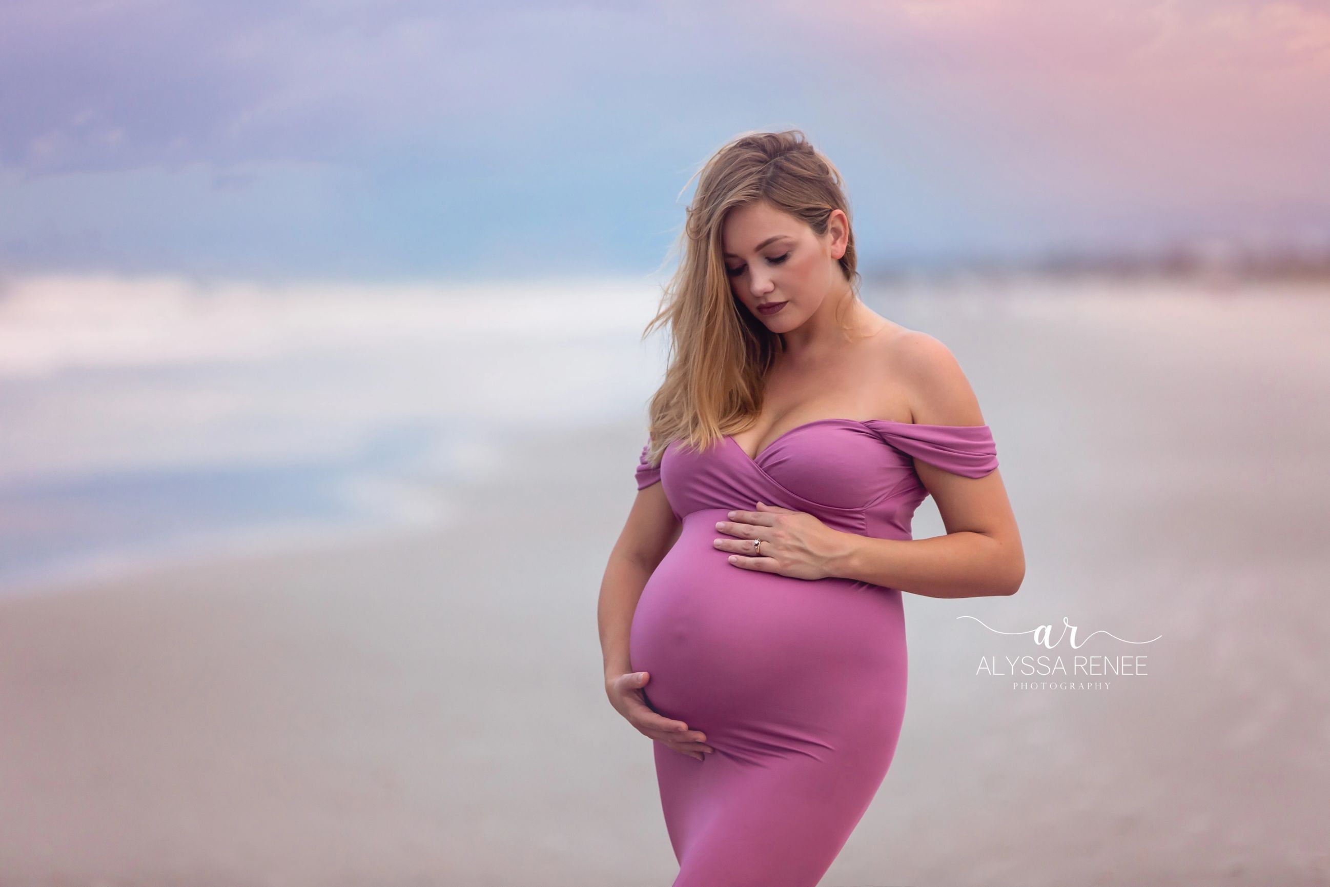 Gorgeous maternity photo in a purple dress from our dress wardrobe by Alyssa Renee Photography