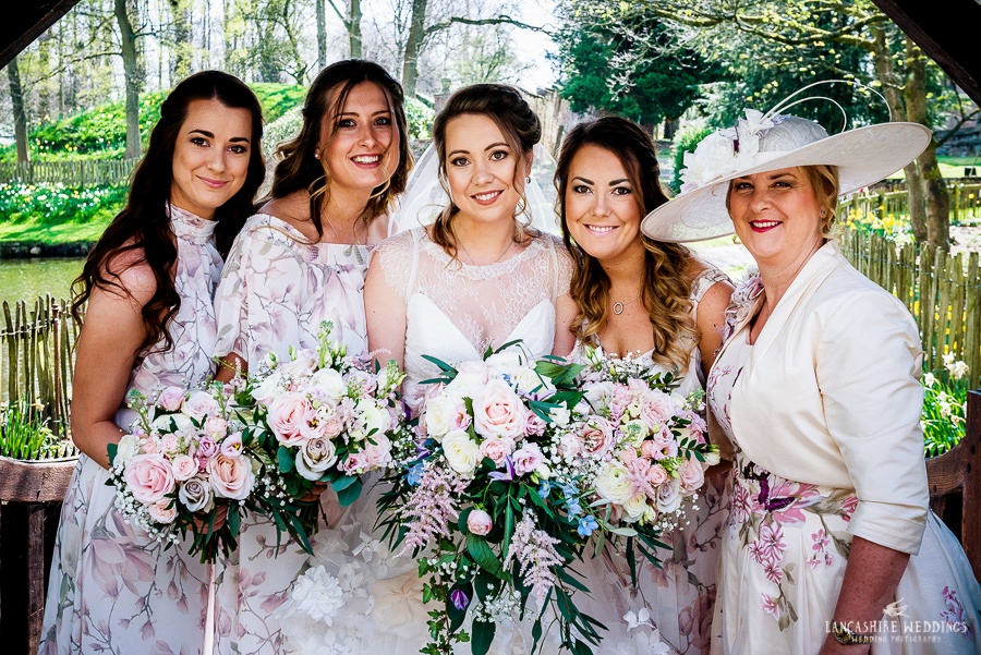 Bride and her bridesmaids group shot at Gawsworth Church
