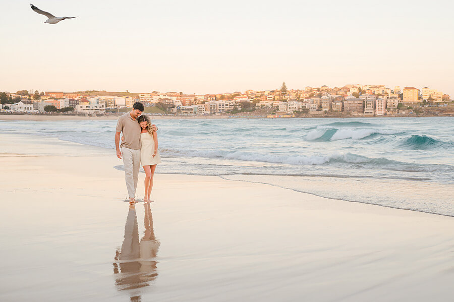 Couple during a photoshoot at Bondi with a Sydney proposal photographer