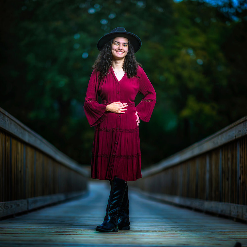 Fine art senior portrait at The Woodlands Waterway in Spring TX, spring bluebonnet bloom, PPA Master Photographer Ty Swartz of Swartz Portraits