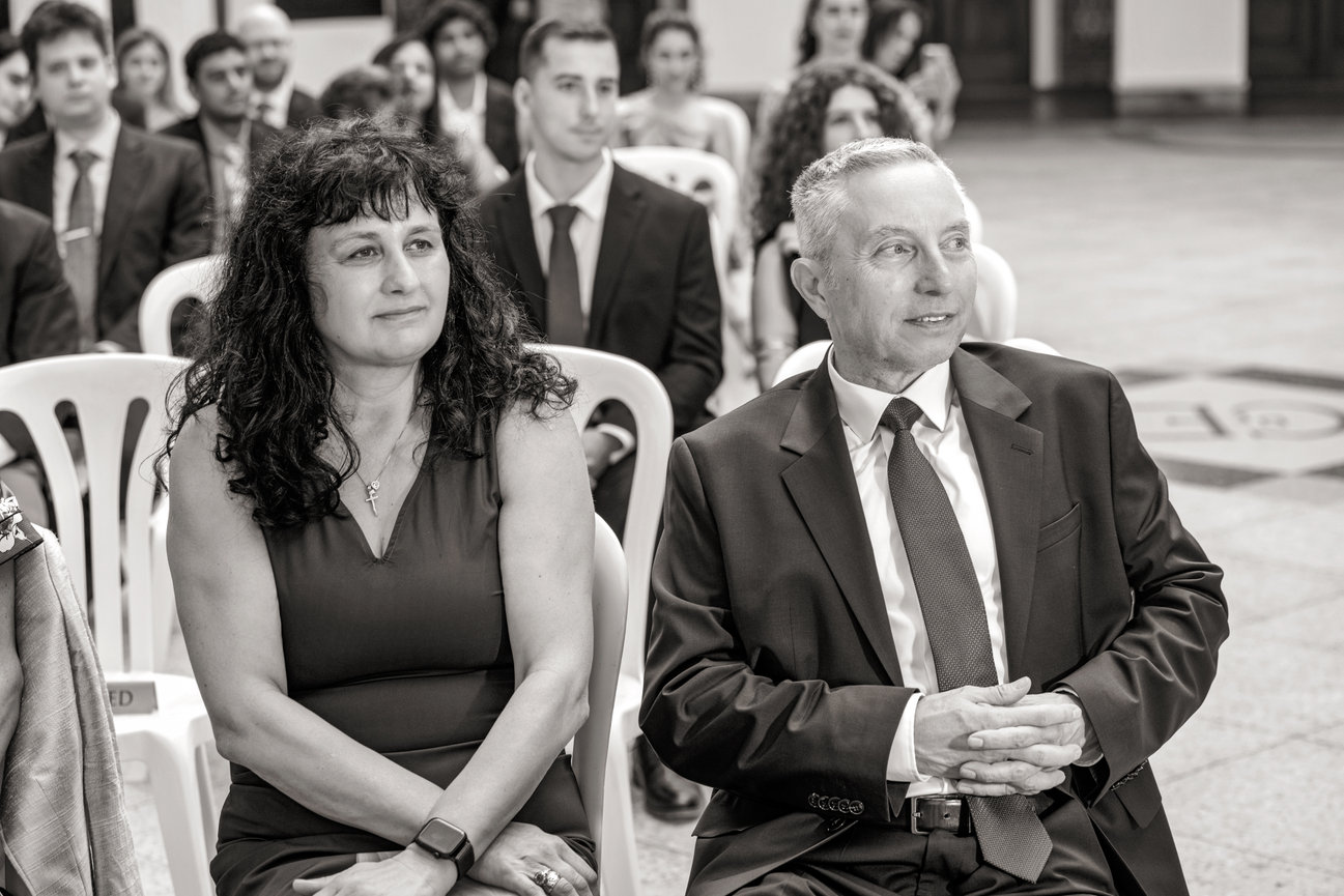 Loved ones sharing an emotional moment during a wedding