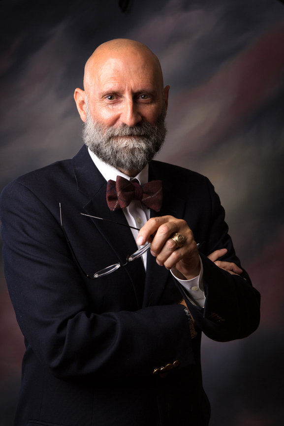 Classic mature bearded male with bow tie and glasses