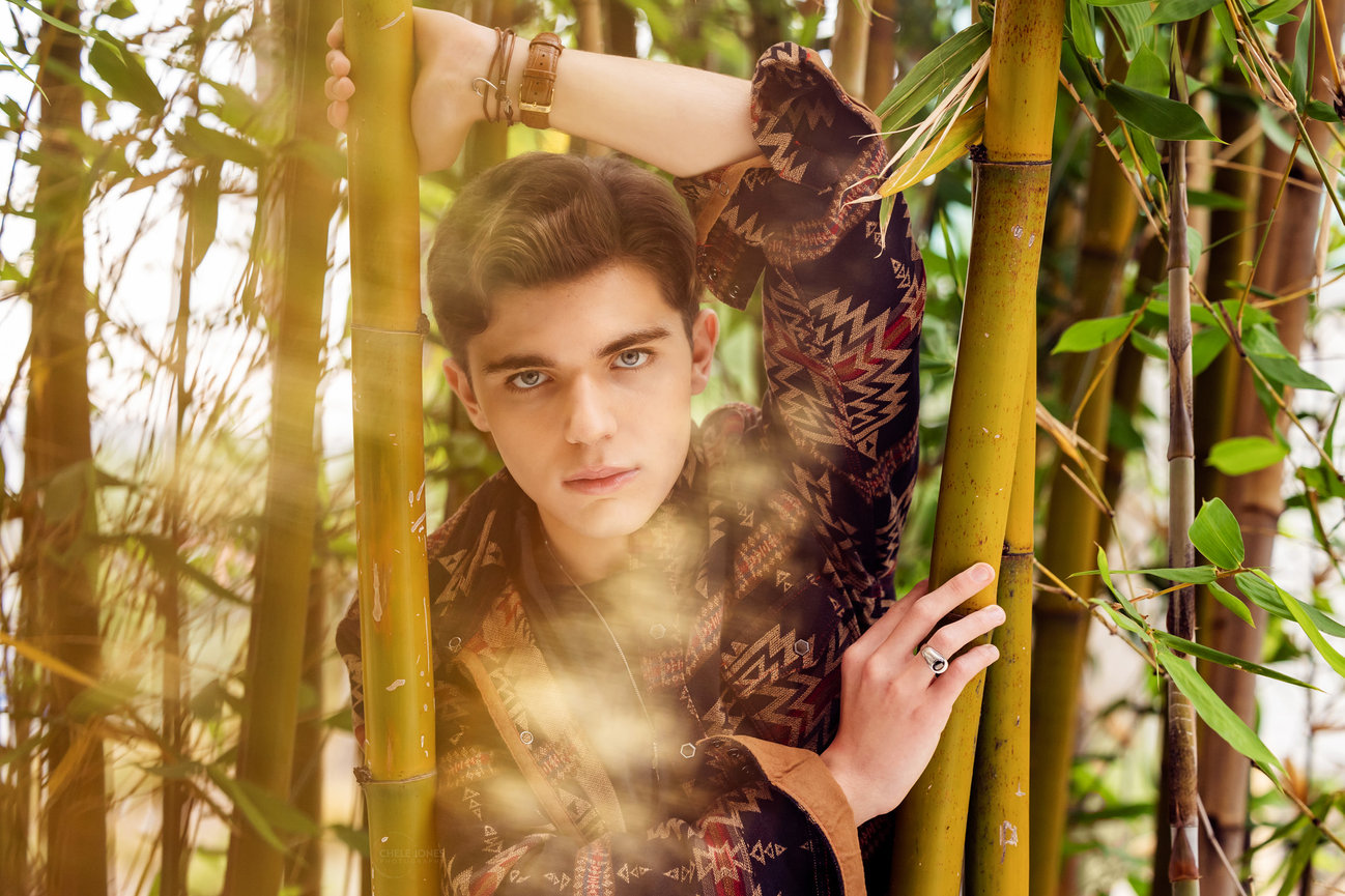 OCSA film TV student shines as the model wearing eclectic western and standing in a bamboo wood in Mission Viejo, CA by Chele Jones photography based in Aliso Viejo.