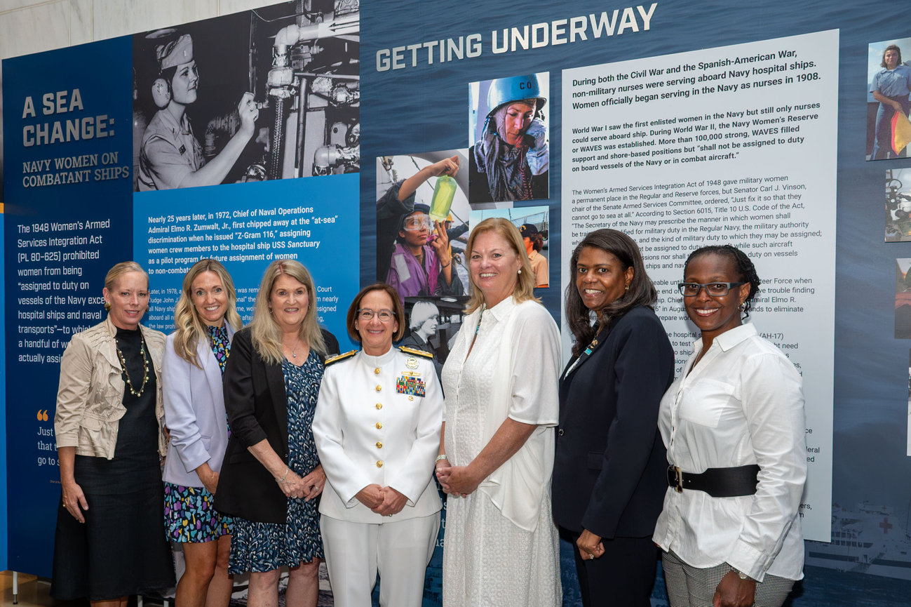 CNO 33 posing with attendants of A Sea Change exhibit at the Women's Memorial