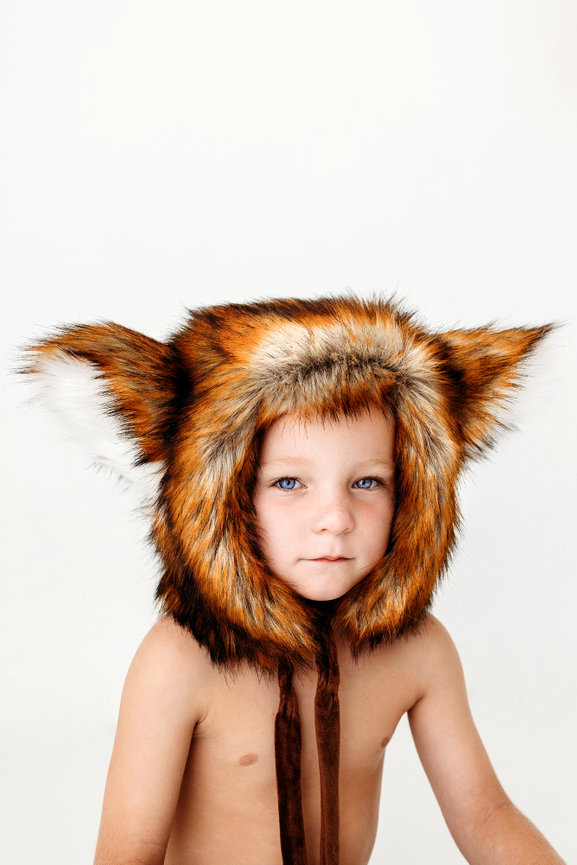 Orange County children’s photography creative portrait of child wearing fox costume in studio
