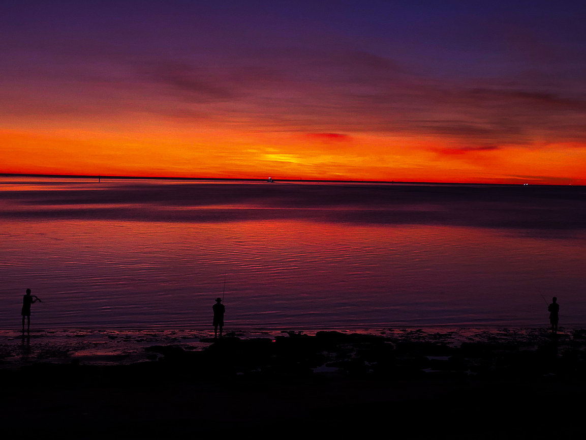 Vibrant sunset reflecting on the ocean