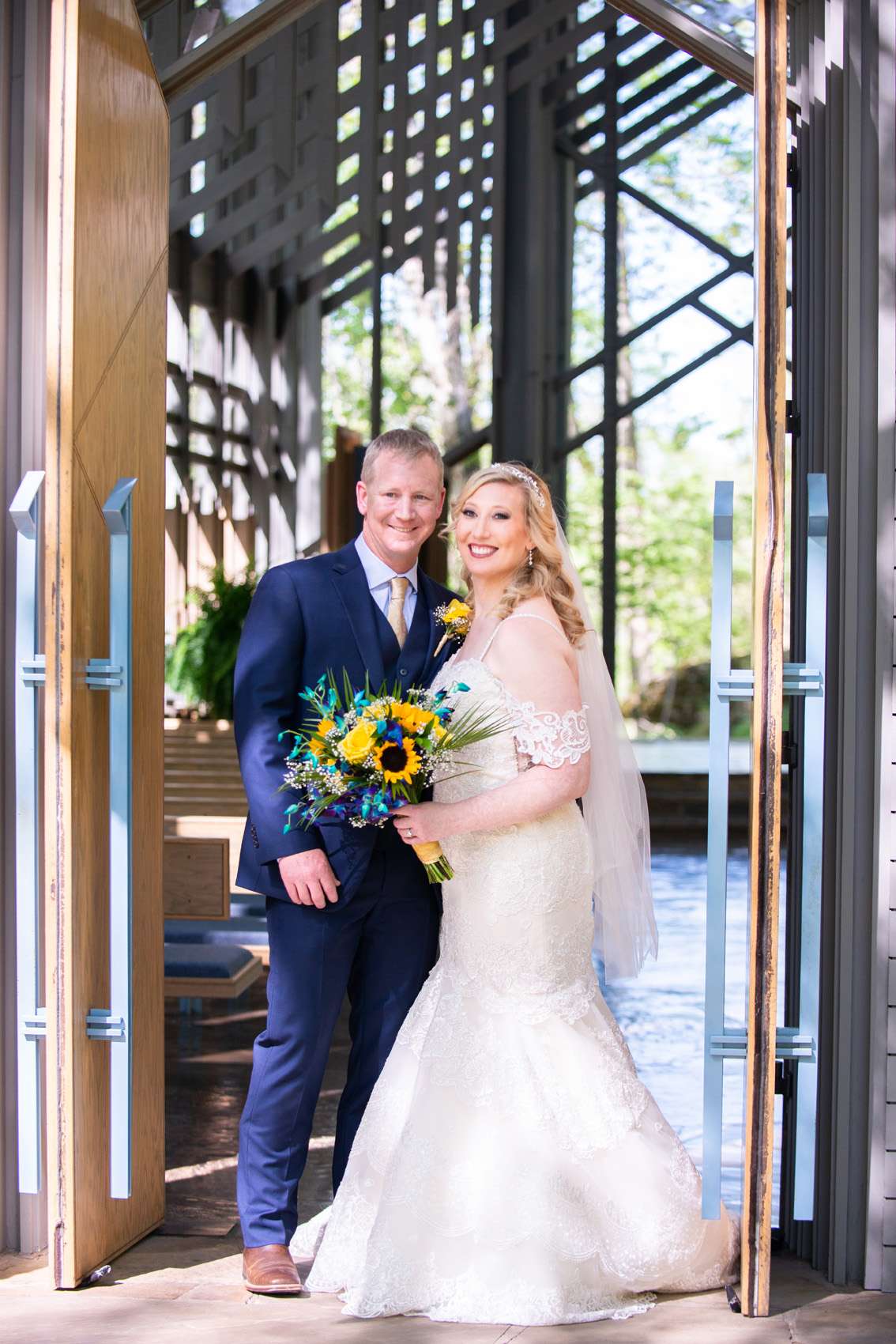 Happy wedding couple at Thorncrown Chapel 