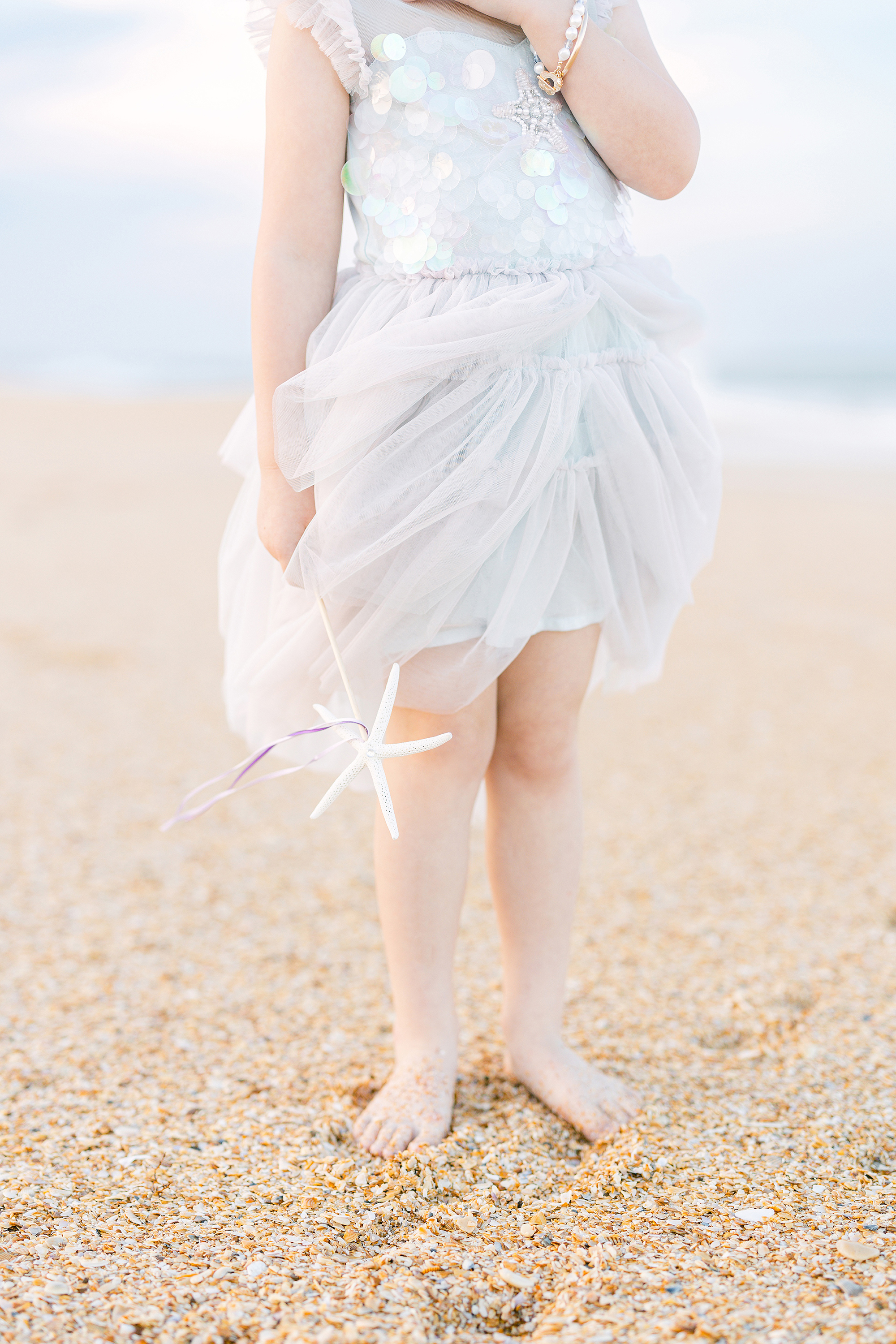 mermaid inspired coastal portraits of a little girl in Saint Augustine Beach