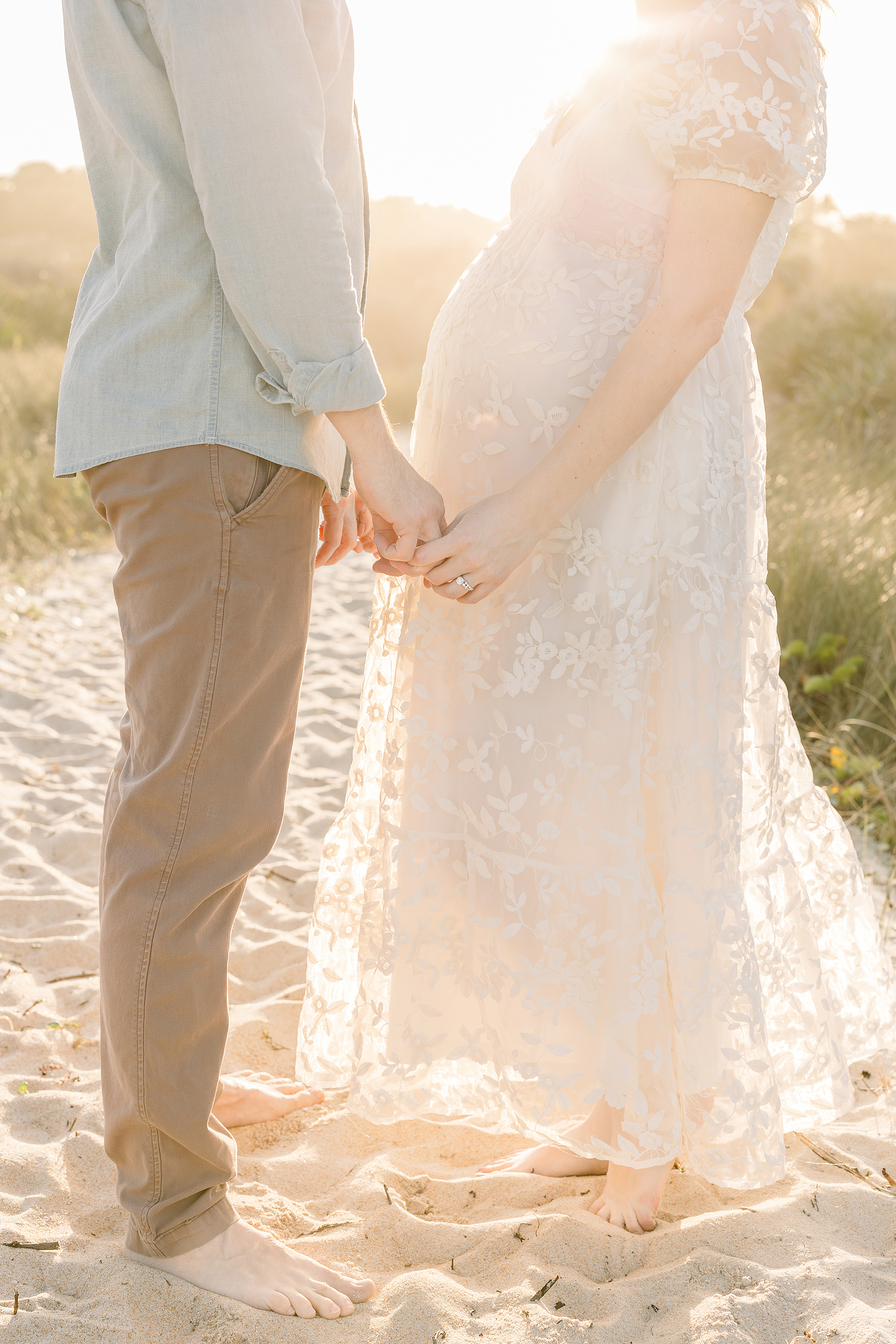 St. Augustine outdoor maternity session at the beach with a beautiful sunset. 