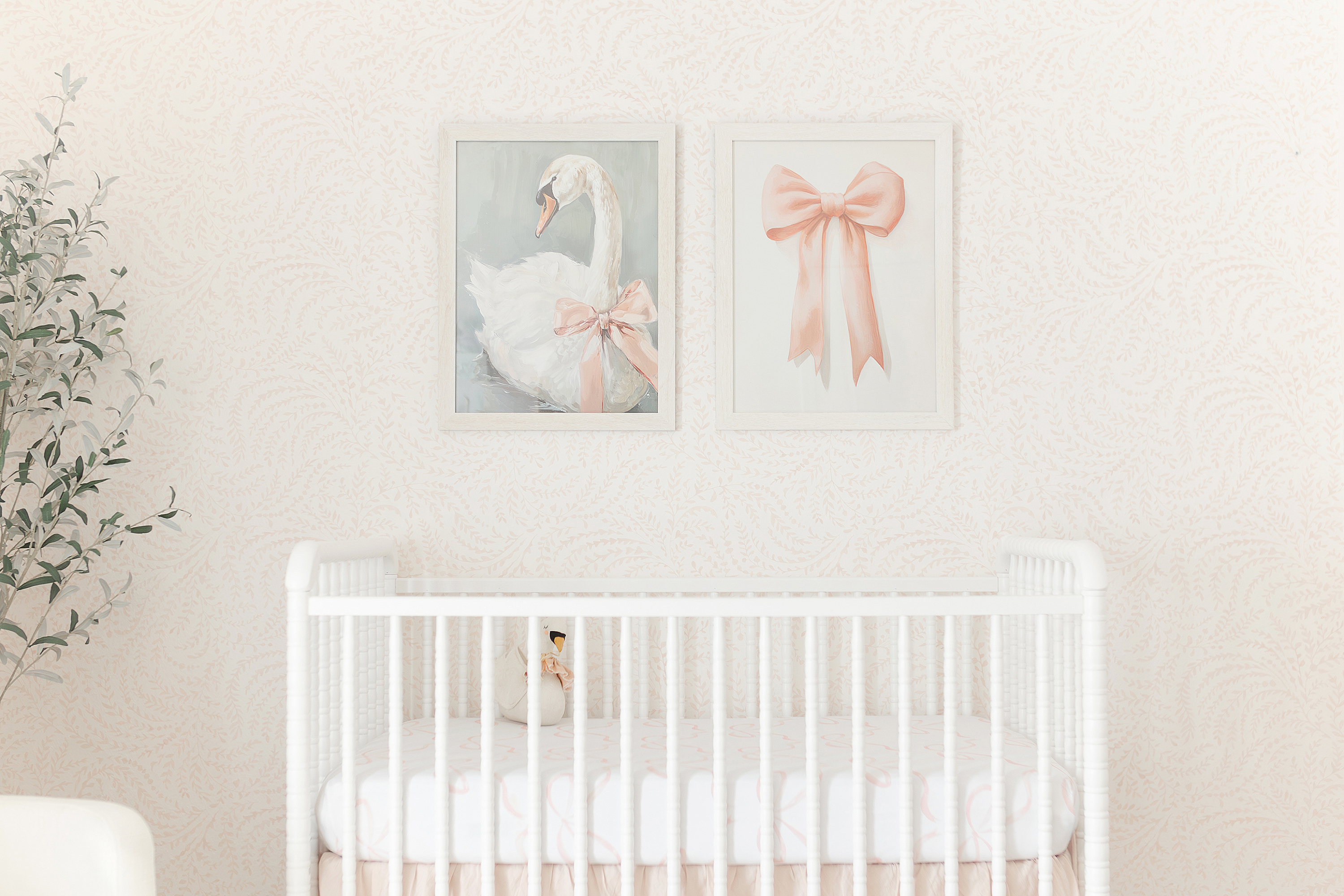 An in home newborn photo session detail shot of a baby girl nursery.