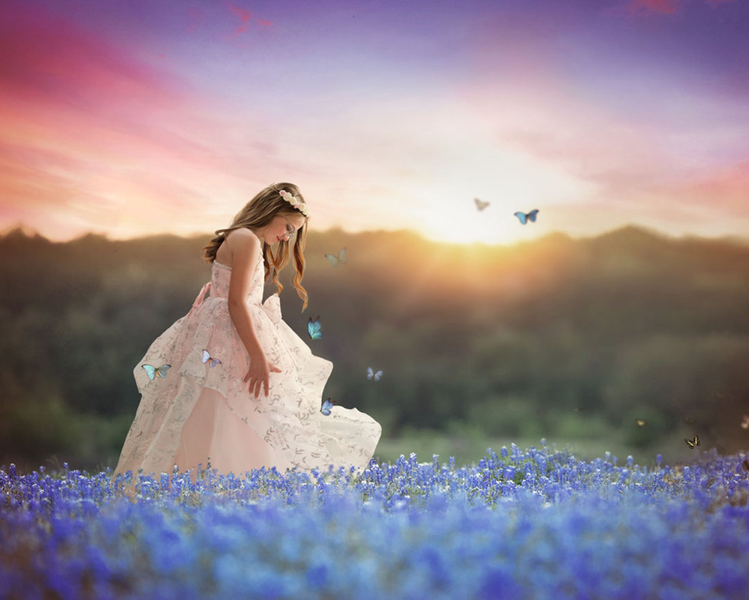Magical photo of girl in flowers with butterflies. Storybook Images portraits of kids.