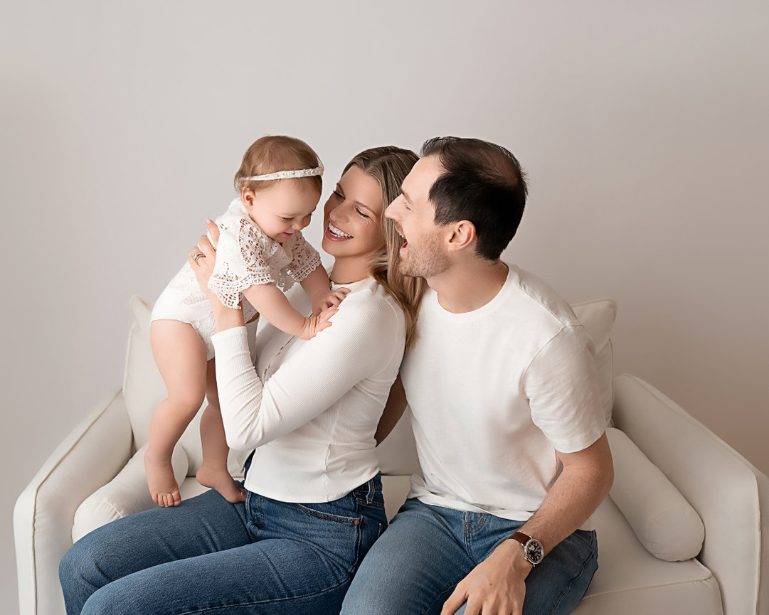 Westfield parents with baby during modern white backdrop session
