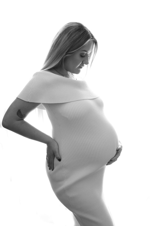 pregnant lady posing for photo
