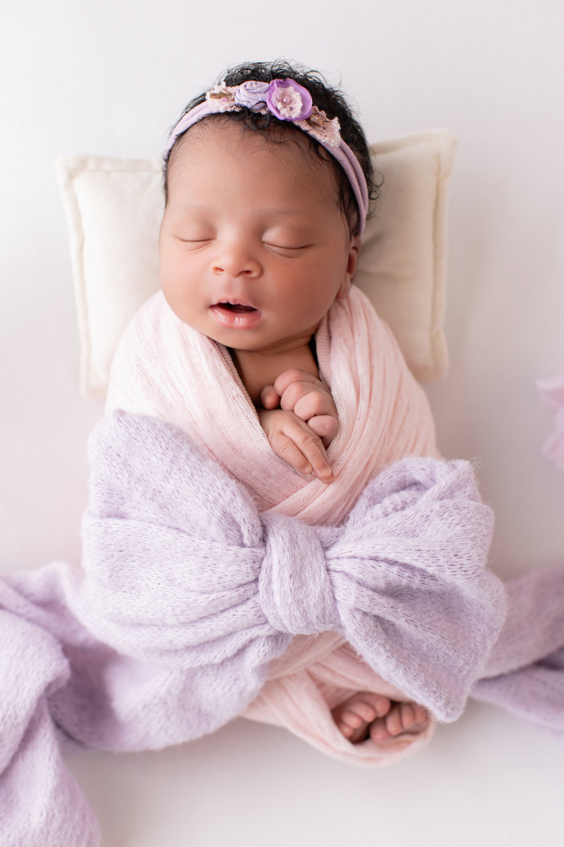 Calgary newborn photography lilac wrap daisies and family Newborn I session photo 2