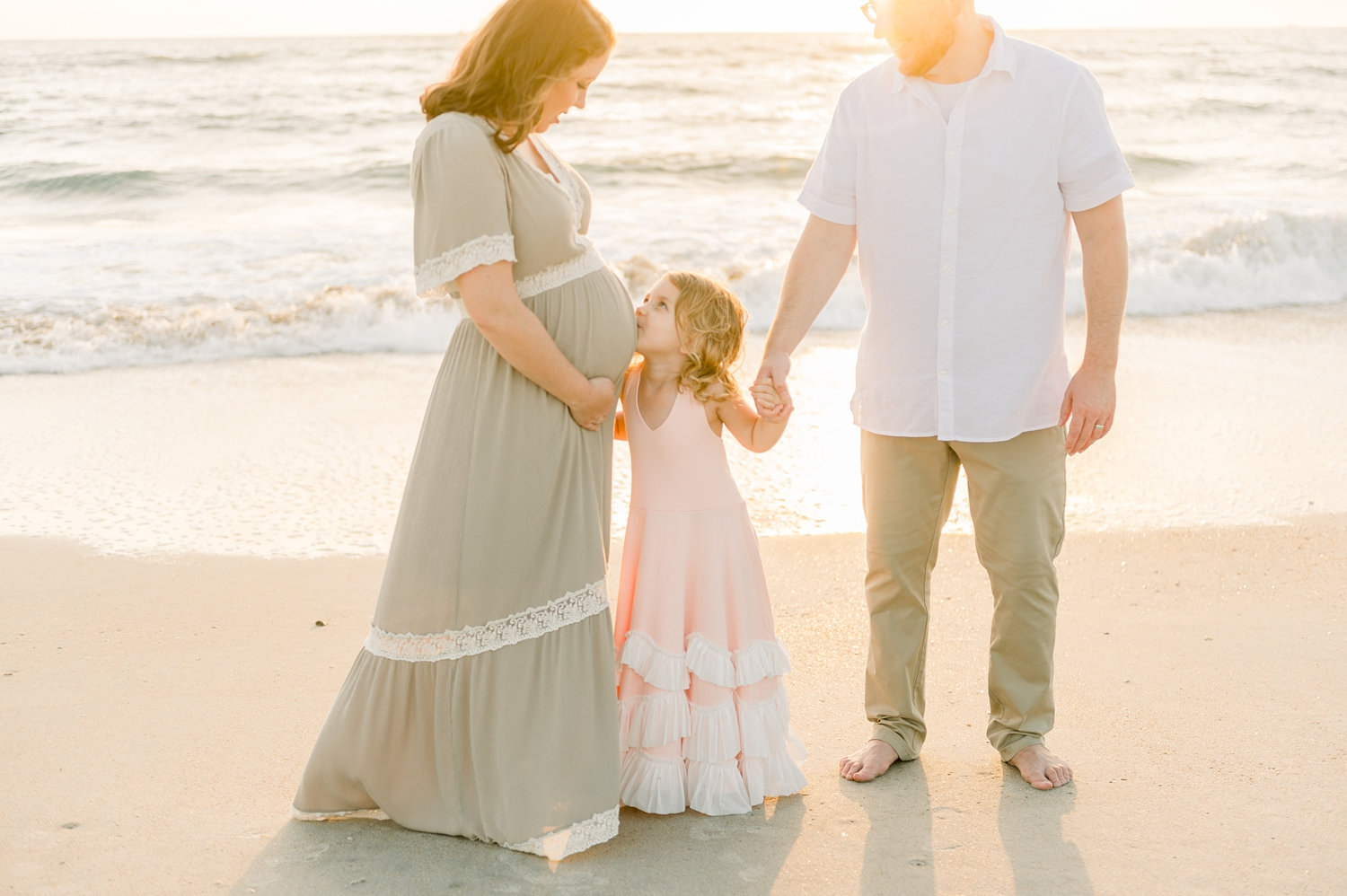 sunrise family beach maternity portrait, mother with husband and daughter