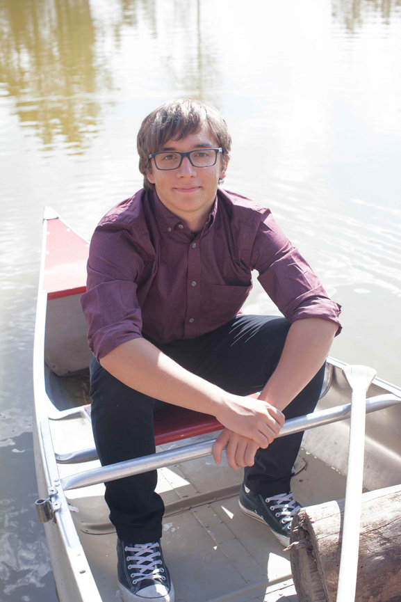 High school senior Eagle Scout a mountain lake outside Vail Colorado, wearing uniform—captured with timeless style to reflect strength, honor, leadership, and love of the outdoors. Luxury senior portrait experience Colorado’s mountain destinations.